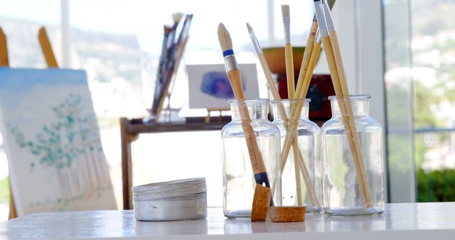 Art Studio with Paintbrushes and Canvas in Bright Natural Light - Download Free Stock Images Pikwizard.com