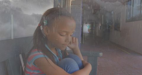 Stressed Young Girl at School with Rainstorm Overlay - Download Free Stock Images Pikwizard.com