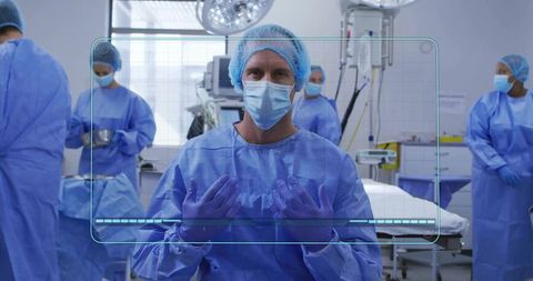 Surgical team preparation in operating room with advanced technology