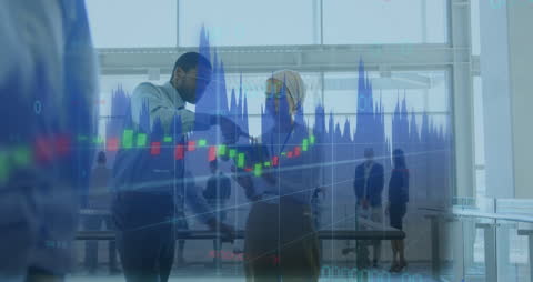 Diverse Professionals Analyzing Financial Stock Data in Office Space