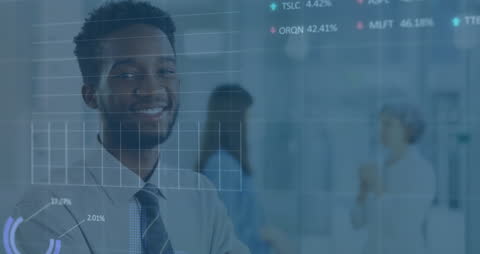 Businessman Analyzing Data with Financial Charts Overlay