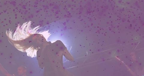 Backlit rock vocalist throwing hair, dynamic stage lights, purple confetti atmosphere