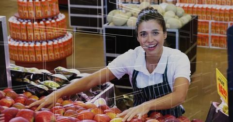 Smiling Grocery Clerk Organizing Fresh Produce in Market