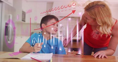 Mother Helping Son with Augmented Reality Homework at Kitchen Table