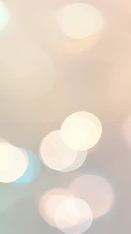 Looping Pastel Bokeh Circles Floating in Vertical Dreamy Ambient Background