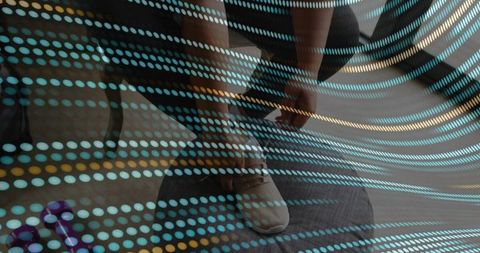 Woman tying running shoe on foam mat with purple dumbbell and digital dot overlay