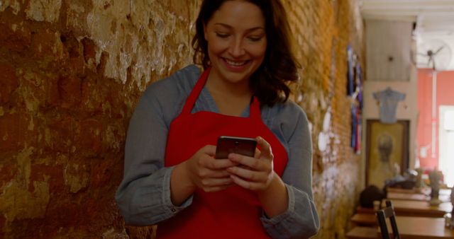 Cafe Worker Using Smartphone During Break - Download Free Stock Images Pikwizard.com