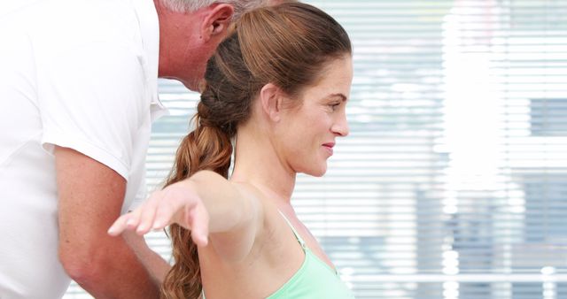 Woman Undergoing Physical Therapy Session with Therapist - Download Free Stock Images Pikwizard.com