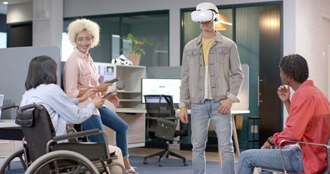 Young Professionals Engaging in Modern VR Office Environment