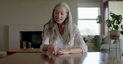 Senior Woman Enjoying Tranquil Moment at Home