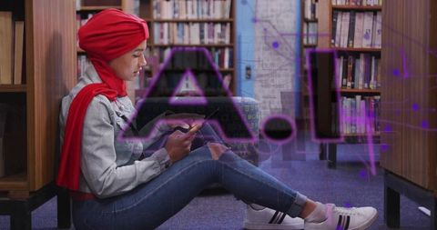 Young woman wearing headscarf using tablet in library with ai hologram overlay for digital learning