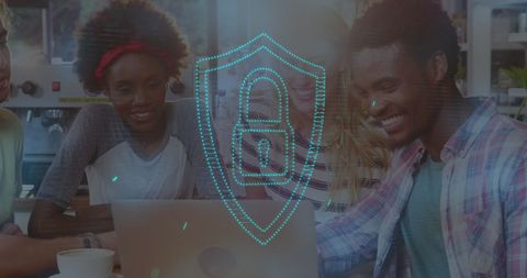 Diverse group working on laptop with digital padlock overlay