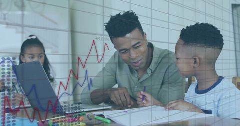 Parent helping children with tablet and homework at home desk with charts overlay