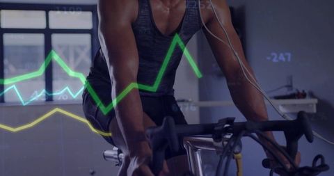 Indoor cycling performance tracking with biometric analytics overlay on exercise bike