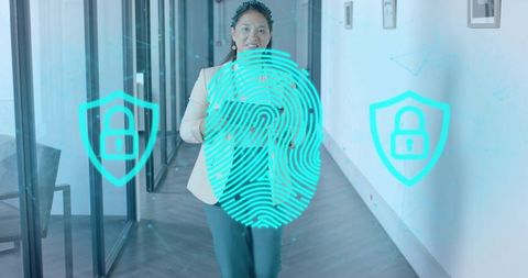 Professional woman with holographic fingerprint and security shields