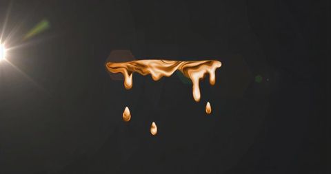 Floating molten gold ribbon with droplets under lens flare