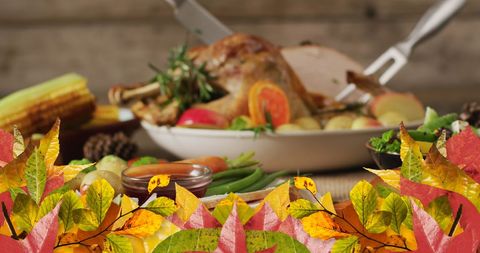 Thanksgiving Celebration with Festive Autumn Leaves Overlay - Download Free Stock Images Pikwizard.com