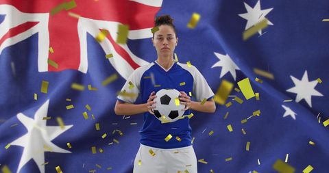 Confident Soccer Player Standing Against Australian Flag