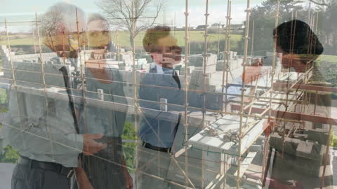 Engineers Collaborating with Construction Site Overlay