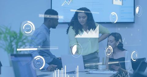 Collaborative team analyzing business data with interactive dashboards and visual analytics