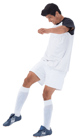 Caucasian Male Kicking Soccer Ball with Transparent Background