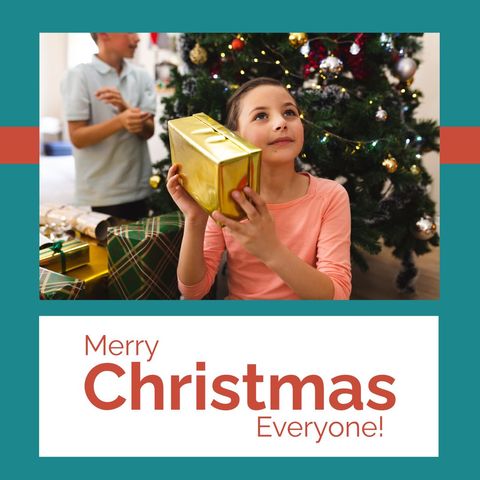 Child contemplating christmas gift near decorated tree