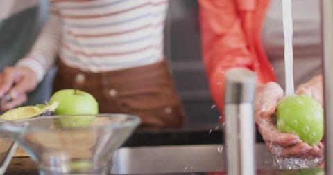 Friends Enjoying Preparing Healthy Smoothies Together