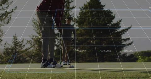 Golfers Analyzing Putts on Course with Digital Technology