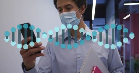 Masked professional checking smartphone with dna graphic overlay in modern office corridor