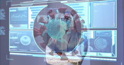 Doctor in PPE Analyzing COVID-19 Data on Futuristic Screen