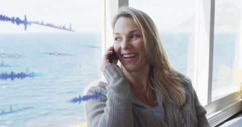 Woman Relaxed Using Smartphone Near Ocean View