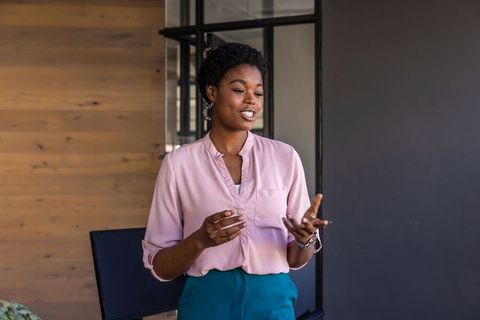 African American Female Professional Giving Business Presentation