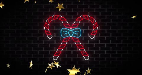 Neon candy canes with falling stars on black brick background