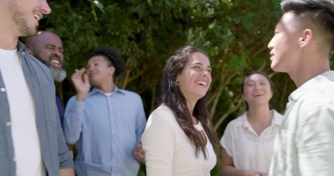 Friends Enjoying Laughter and Easy Conversations at Outdoor Gathering