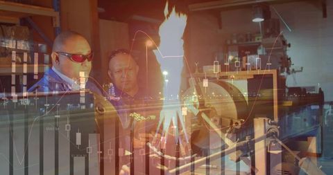 Technicians welding with torch and chart overlay depicting industrial production analytics