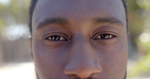 Close-Up of African American Man's Eyes Showing Focus and Determination - Download Free Stock Images Pikwizard.com