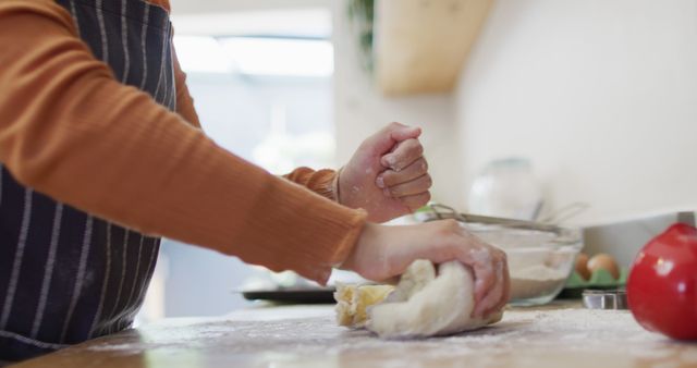 Person kneading dough in modern kitchen - Download Free Stock Images Pikwizard.com