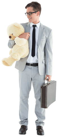 smiling young businessman holding briefcase and teddy bear, transparent background - Download Free Stock Videos Pikwizard.com