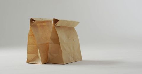 Brown Paper Lunch Bags on Simple Modern Background - Download Free Stock Images Pikwizard.com