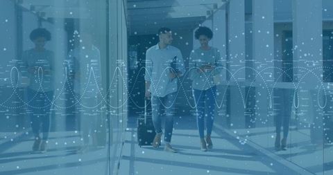 Business travelers walking innovative high-tech corridor