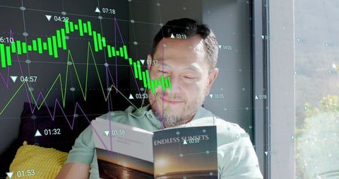 Asian man reading endless sunsets paperback by window with financial data overlay