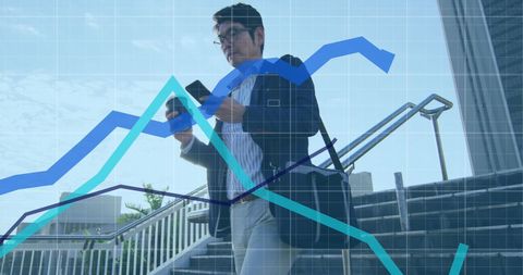 asian businessman on phone with overlaid graphs concept - Download Free Stock Images Pikwizard.com