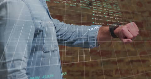 Businessman Analyzing Stock Market Data on Smartwatch