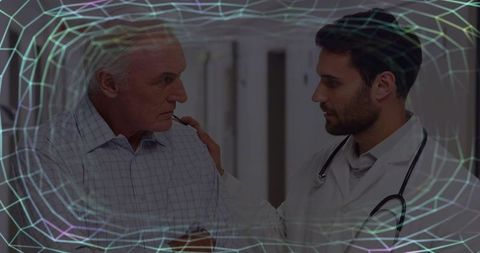 Doctor placing hand on senior patient reassuring with augmented reality grid overlay