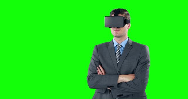 Businessman Using Virtual Reality Headset with Green Screen Background - Download Free Stock Images Pikwizard.com