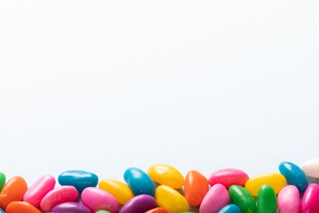 Colorful Candies on White Background with Copy Space - Download Free Stock Photos Pikwizard.com