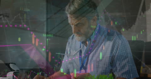 Engineer Analyzing Data at Workstation with Graphs Overlay