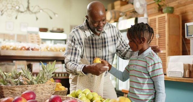 Grandfather and Granddaughter Shopping for Fresh Fruit - Download Free Stock Images Pikwizard.com