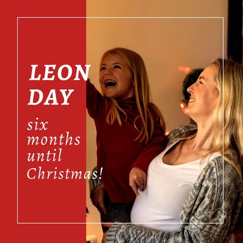 Joyful Leon Day Celebration with Smiling Mother and Daughter