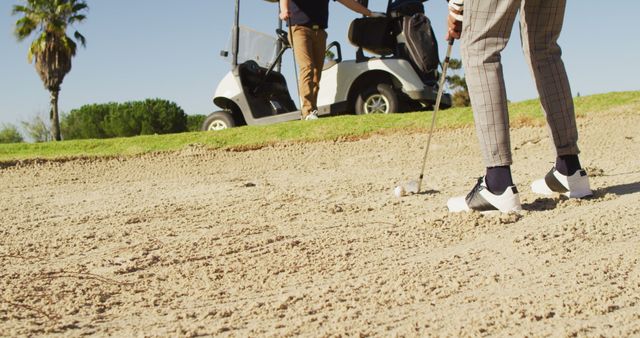 Image of legs of diverse male friends playing golf on golf field - Download Free Stock Photos Pikwizard.com
